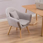 Ergonomic Nordic padded chair with thick cushion, backrest, and wooden legs.
